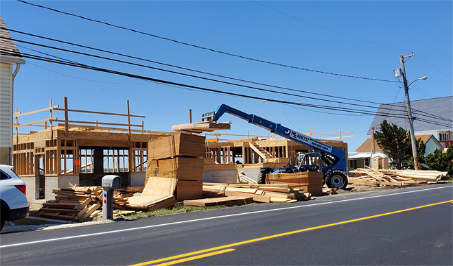 High winds damge to house construction.